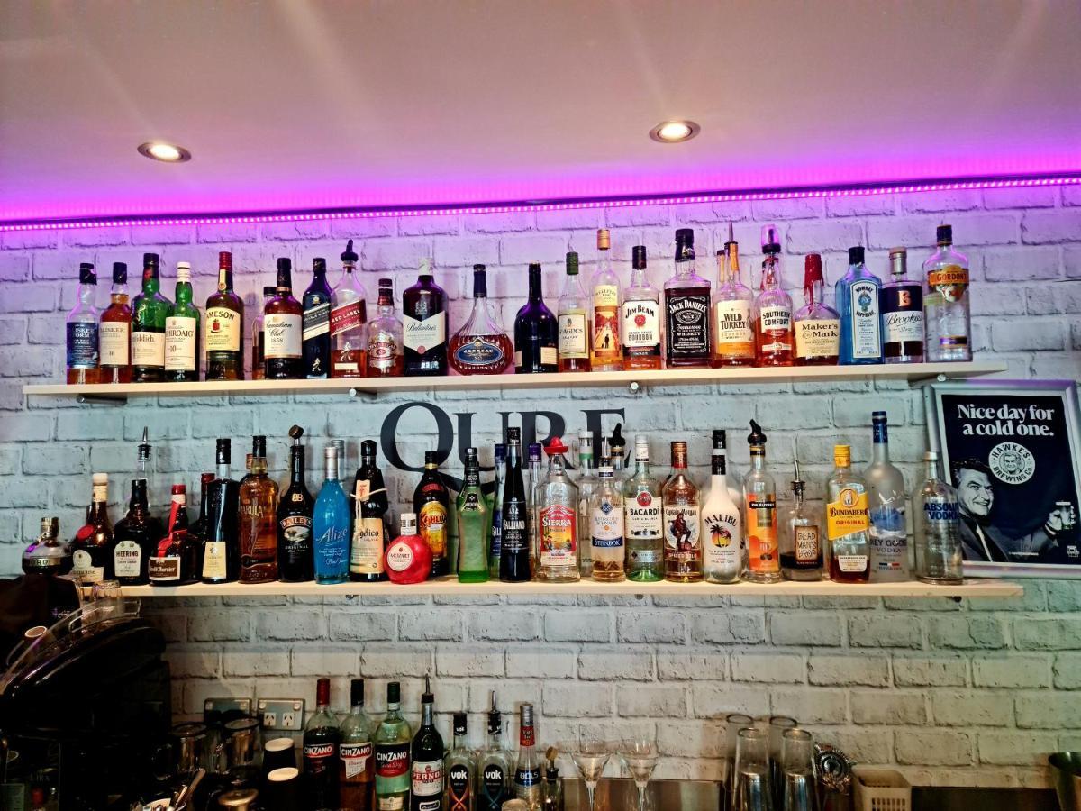 Qure Restaurant And Bruce *